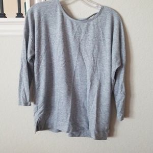 Grey shirt open back
